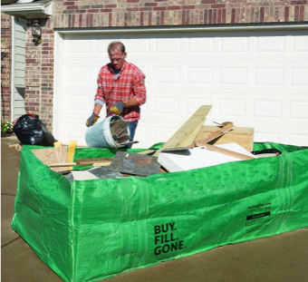 Man recycling shingles